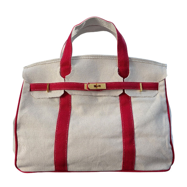 Red Boatkin bag with with gold hardware on a white background