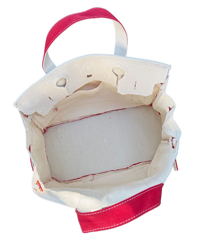 Red Boatkin bag showing roomy interior and pocket.