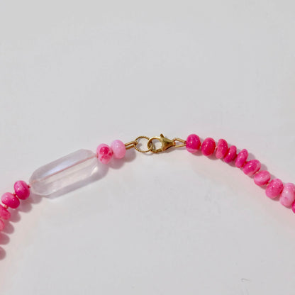 Rose quartz and pink candy necklace close up.