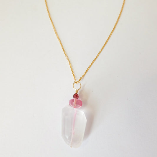 Rose quartz, pink topaz, and garnet charm necklace on a 14K gold-filled chain