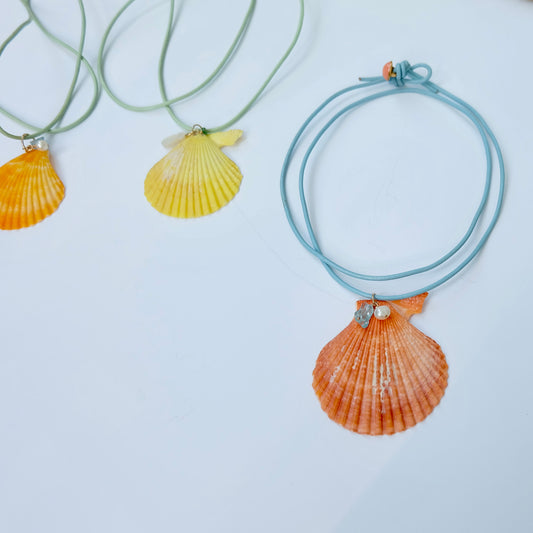Handmade sea shell pendant necklaces with gemstones on colorful leather cords