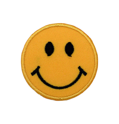Small smiley face embroidered iron-on patch