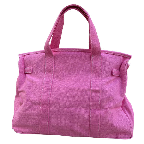 Solid pink Boatkin bag back view on a white background