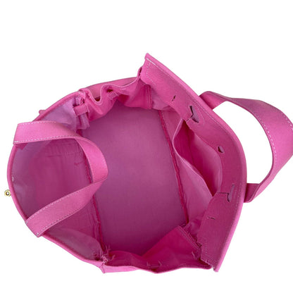 Interior view of the solid pink Boatkin bag on a white background.
