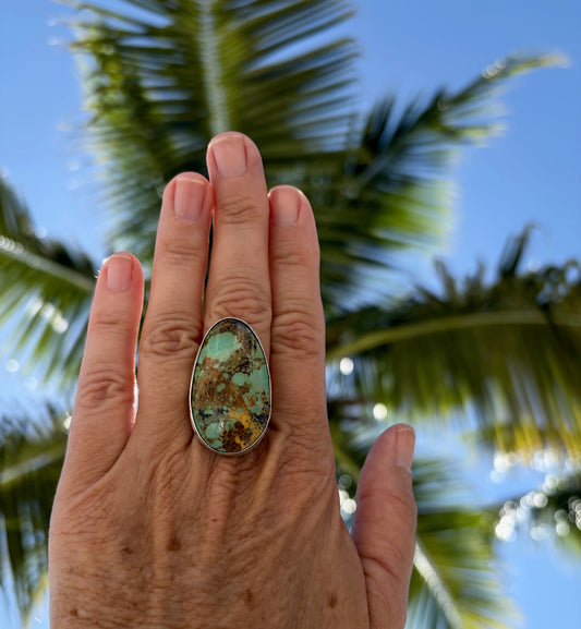 Handmade sterling silver Stella Blue turquoise ring with a polished band