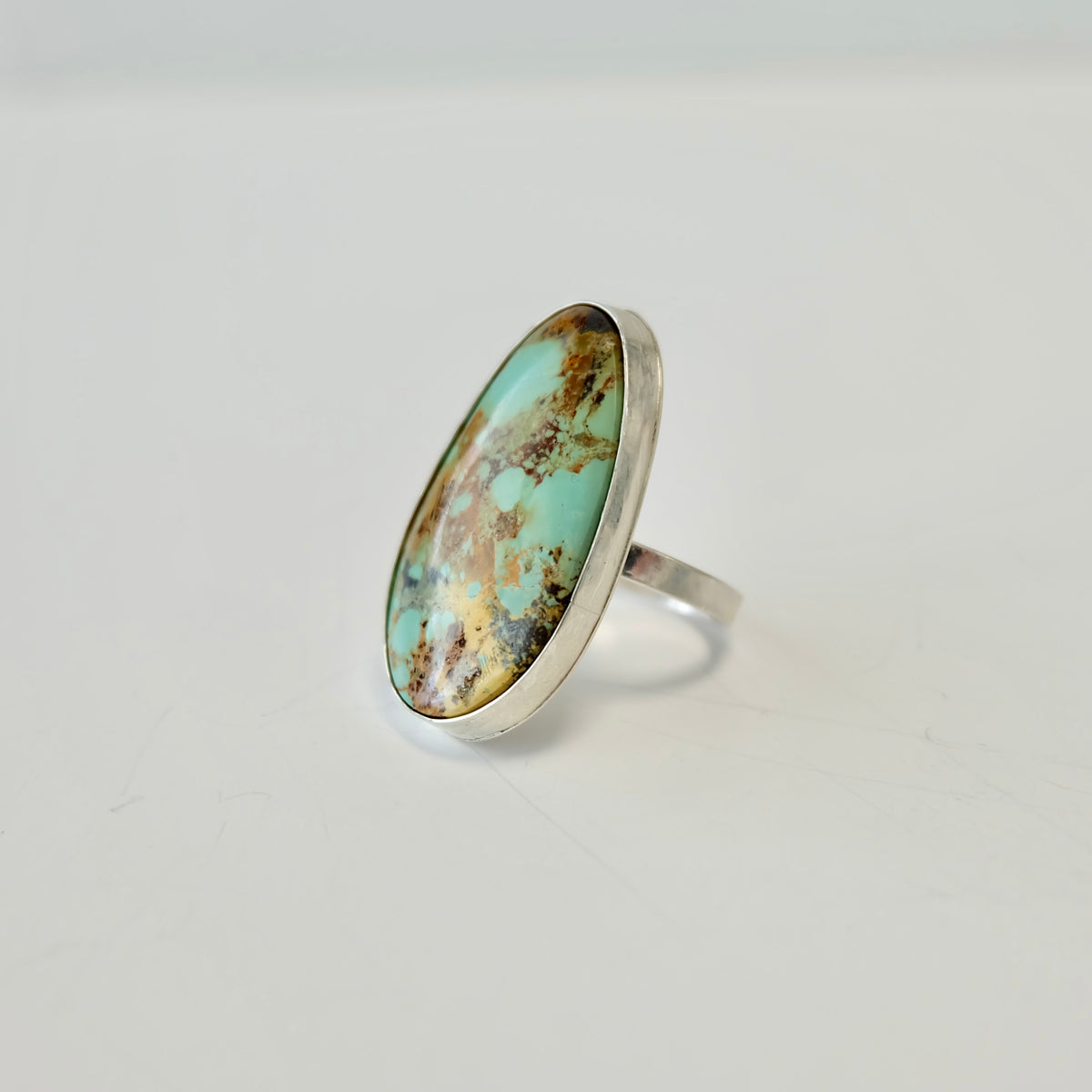 Side view of the Stella Blue turquoise marquise ring, size 8.75