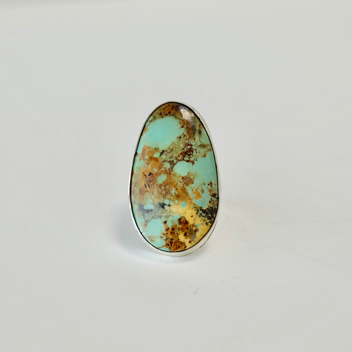 Stella Blue turquoise marquise ring in sterling silver with natural brown and black matrix