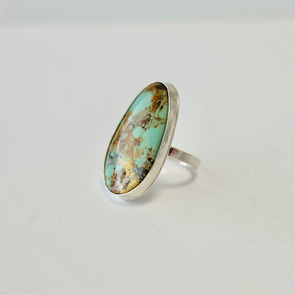 Stella blue turquoise ring on a light gray background