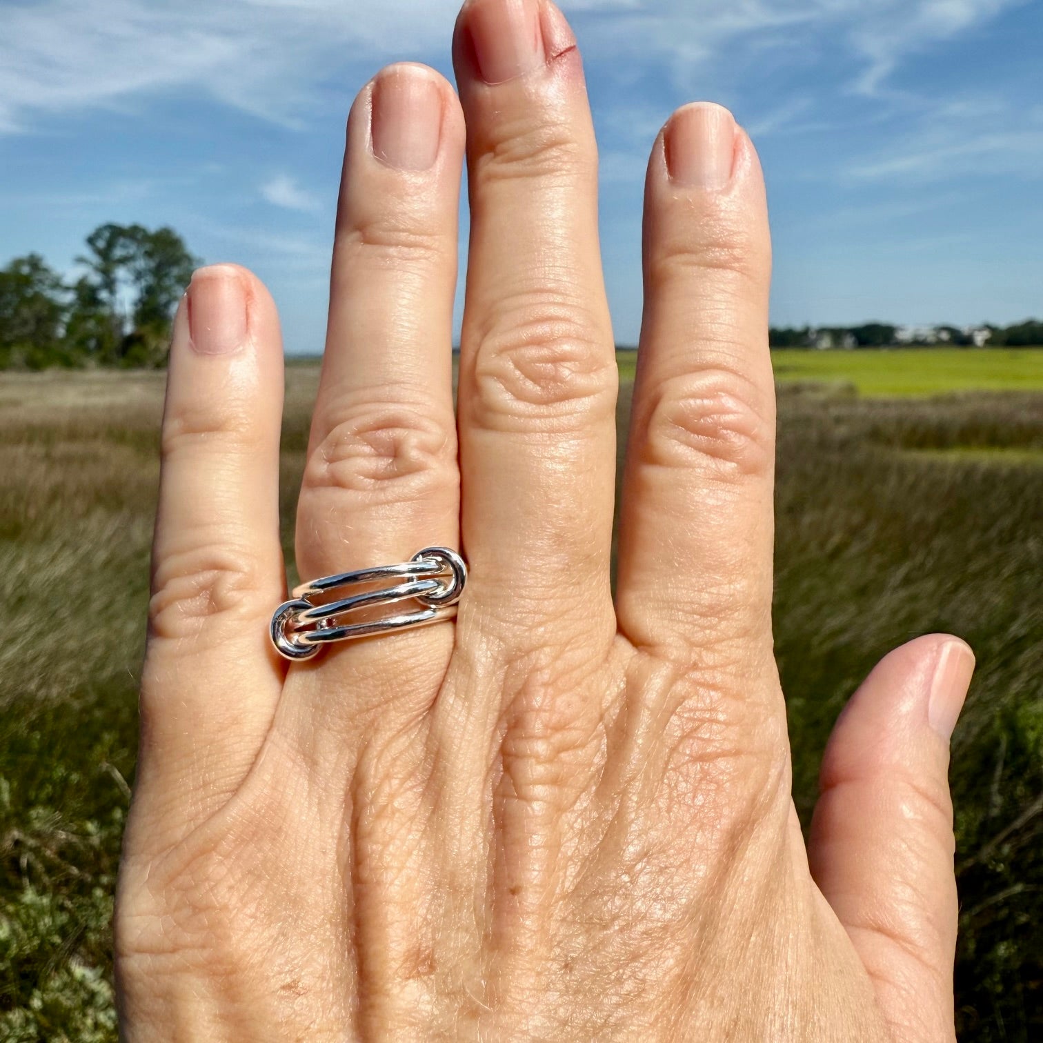 Close up of sterling silver interlocking ring