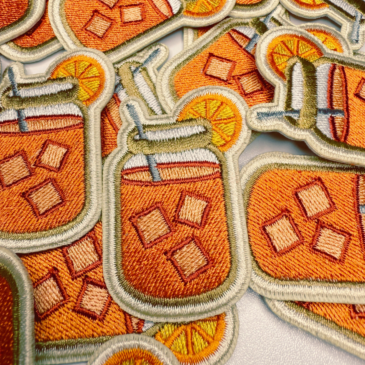 Sweet tea iron-on patch with ice cubes and striped straw, 2 inches