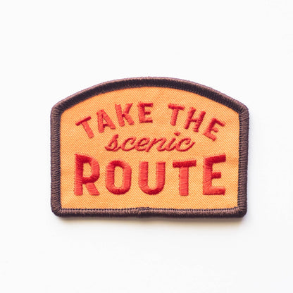 Take the Scenic Route embroidered iron-on patch in brown, orange, and red