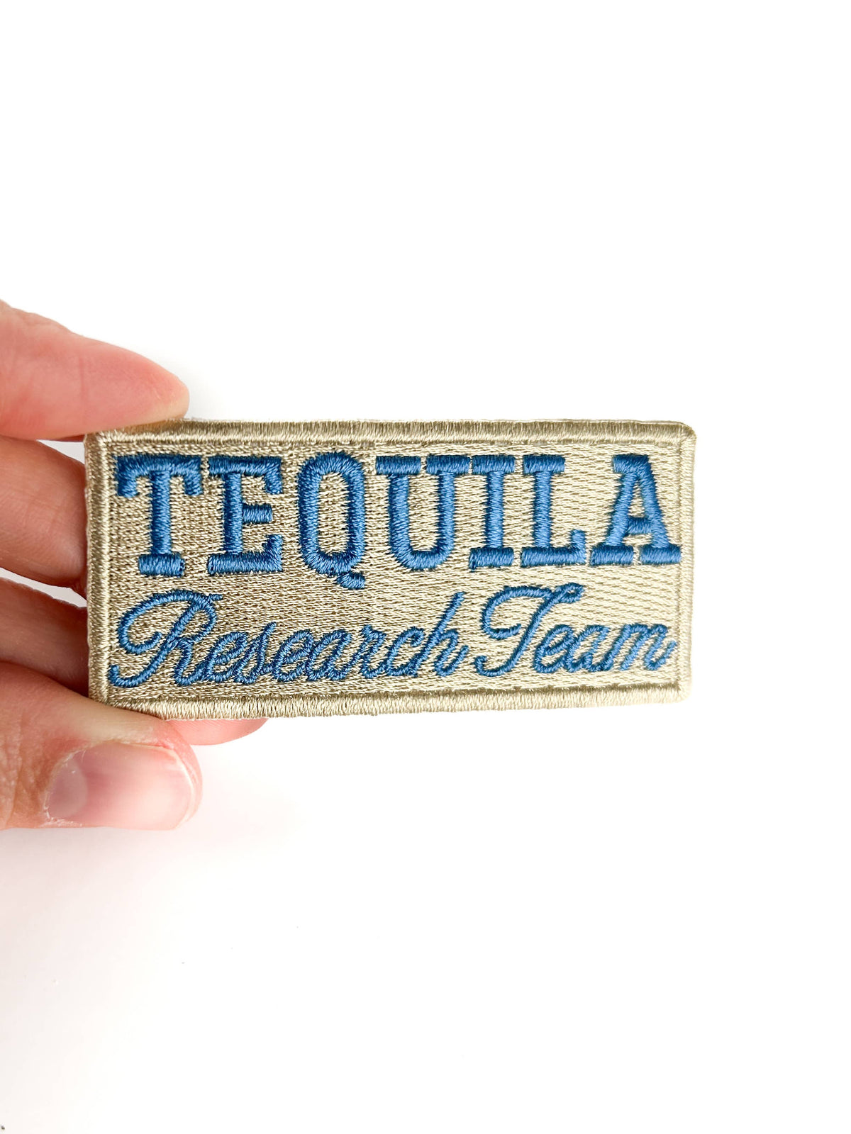 Tequila Research Team embroidered iron-on patch with text lettering