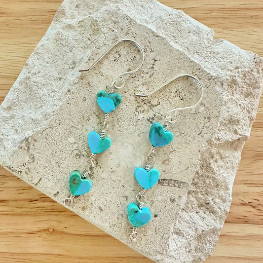 Elegant turquoise heart earrings, showcasing a vibrant color and delicate design, perfect for adding a touch of charm.