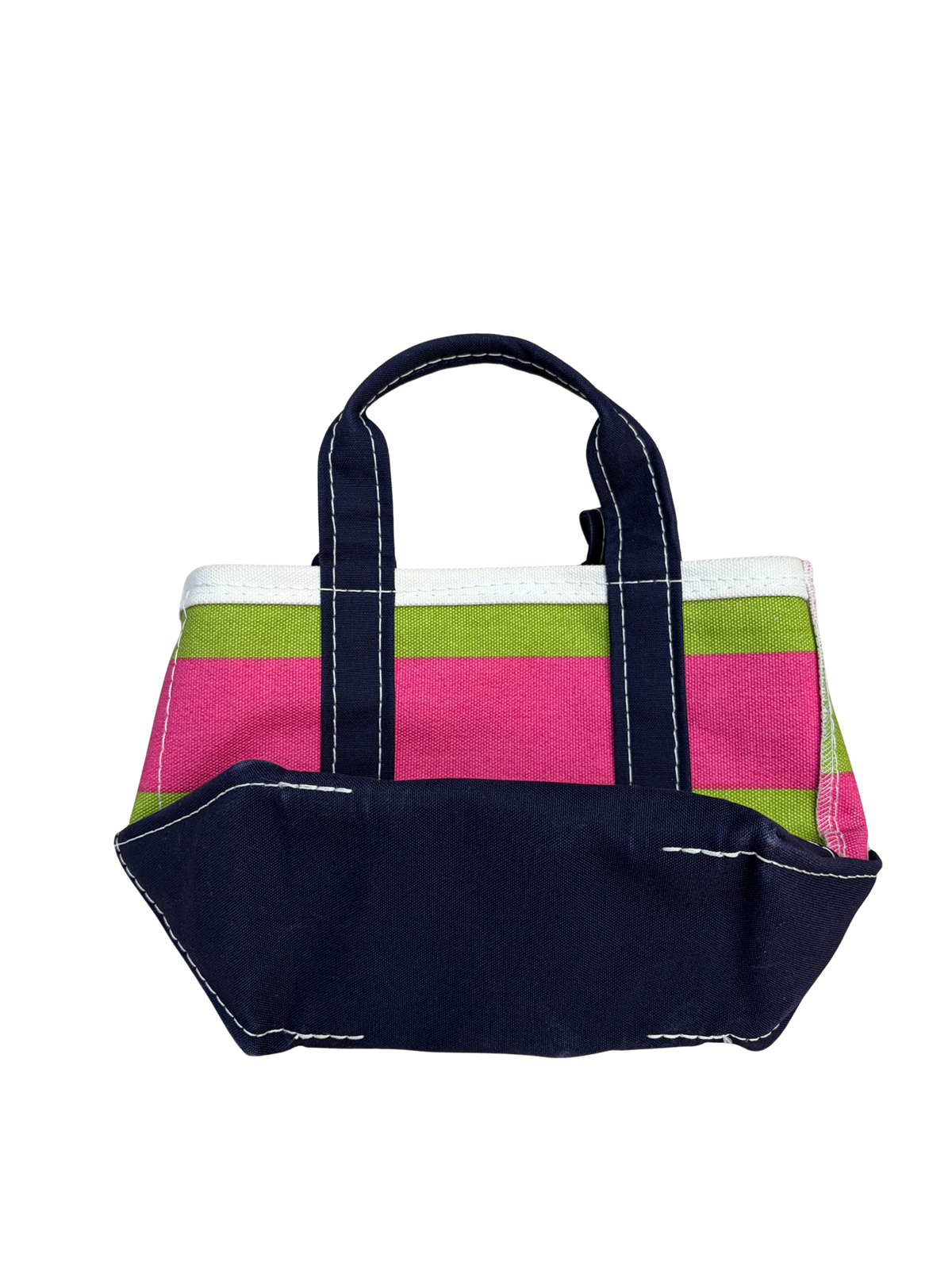 Bottom view of the reverse side of the vintage L.L. Bean mini canvas pink and green rugby stripe tote bag standing completely straight and upright.