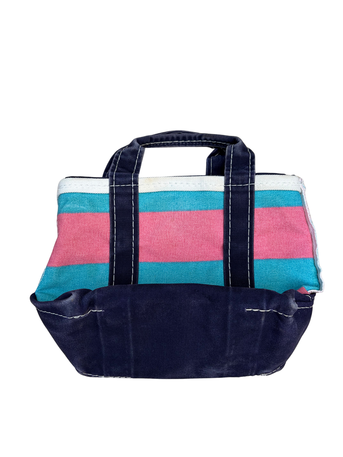 Bottom of the blue and pink rugby stripe vintage L.L. Bean mini boat and tote bag showing its scale and structural shape.