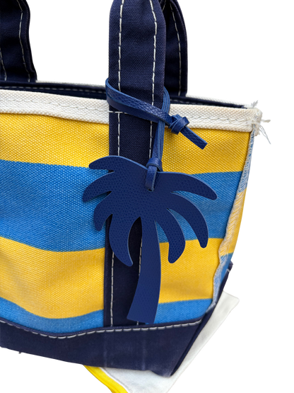Side profile view of Vintage L.L. Bean Tote — Mini Navy and yellow rugby Stripe showing the zip top closure and gusset seams.
