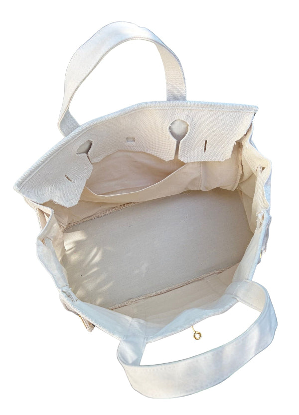White Boatkin bag interior with a pocket on a white background