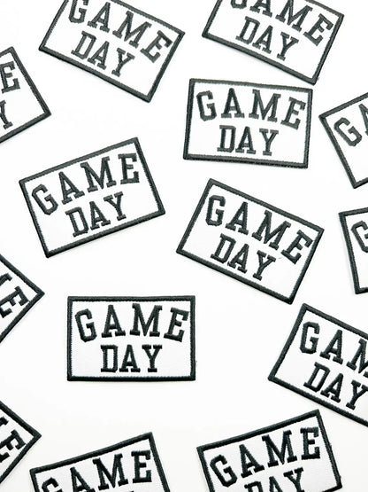 Pattern of 'GAME DAY' text on a white background