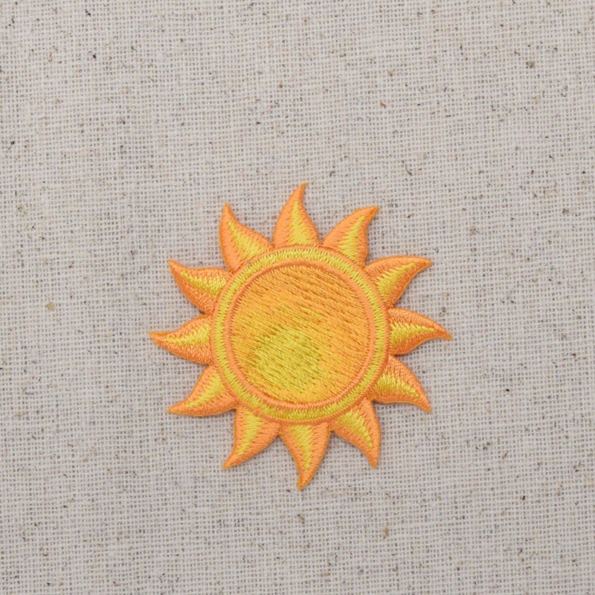 Yellow sun embroidered iron-on patch, view 2